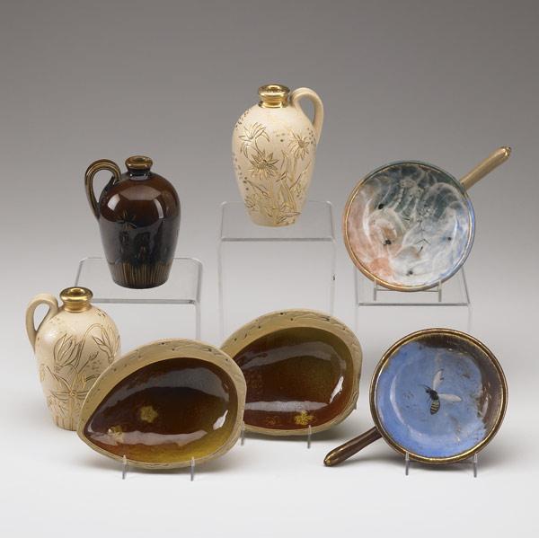 Appraisal: ROOKWOOD Seven early items three small jugs two Limoges-style ramekins