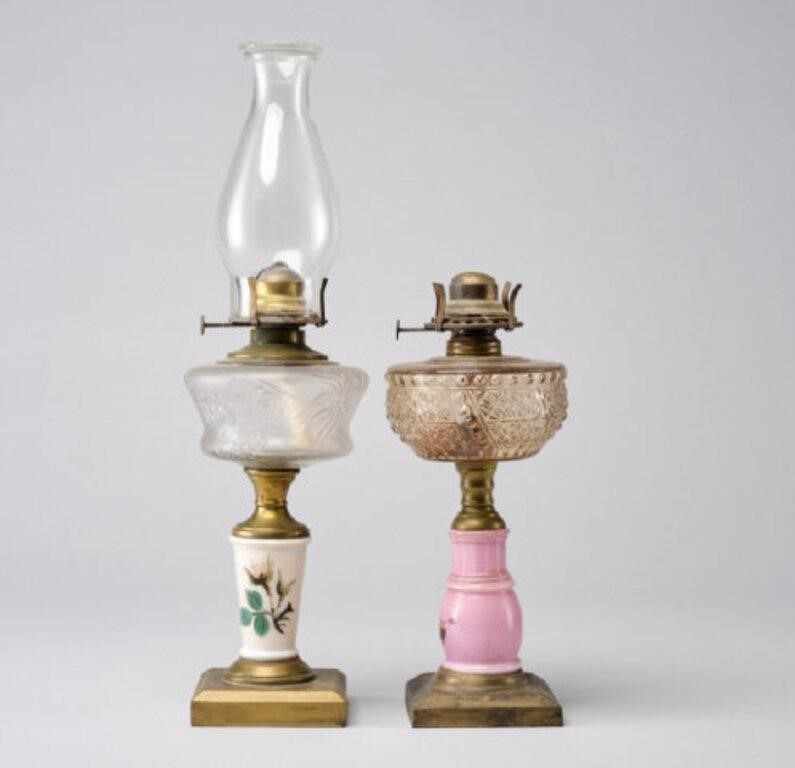 Appraisal: TWO ANTIQUE OIL LAMPSTwo antique oil lamps a gilt iron