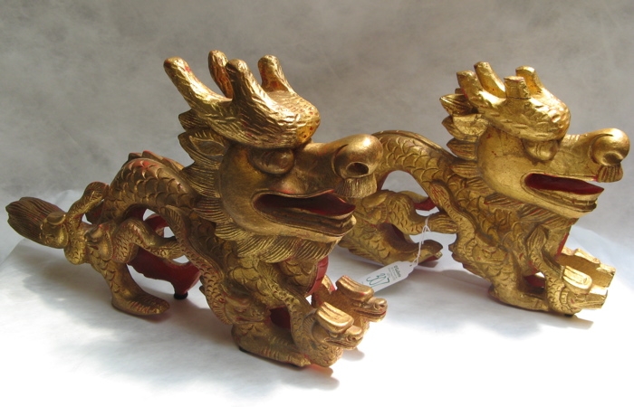 Appraisal: PAIR HAND CARVED RED GILT WOOD DRAGON FIGURES slight variations