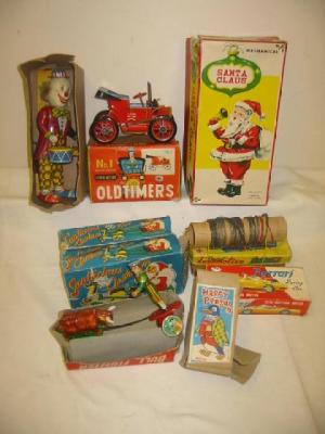 Appraisal: Nine various tin plate novelty clockwork toys mainly boxed F-G