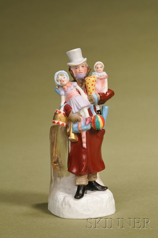 Appraisal: Bisque Figure of a Man Holding Christmas Toys Germany c