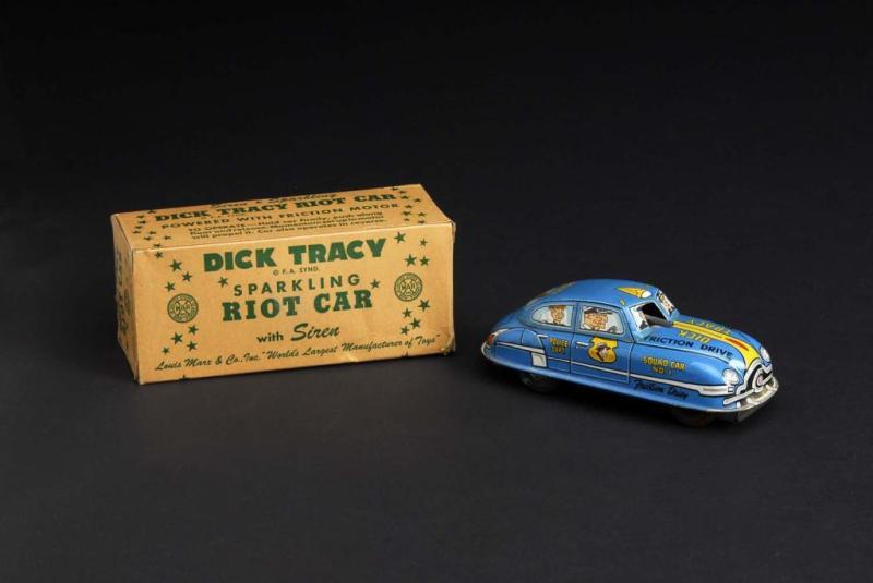 Appraisal: Tin Marx Dick Tracy Riot Car Friction Toy Description American