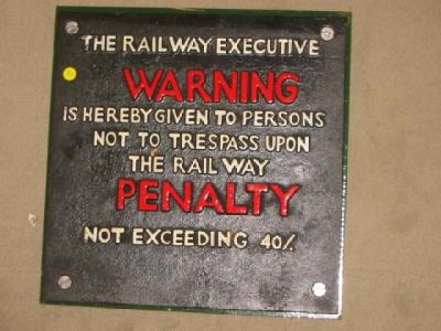 Appraisal: A cast iron Railway Executive trespass warning sign square mounted