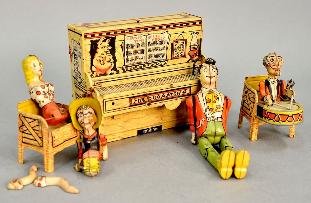 Appraisal: Lil Abner Dogpatch Band tin wind toy set Lil Abner