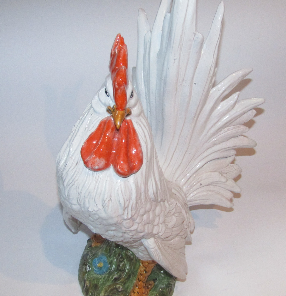 Appraisal: A thC Continental pottery group of a standing cockerel of