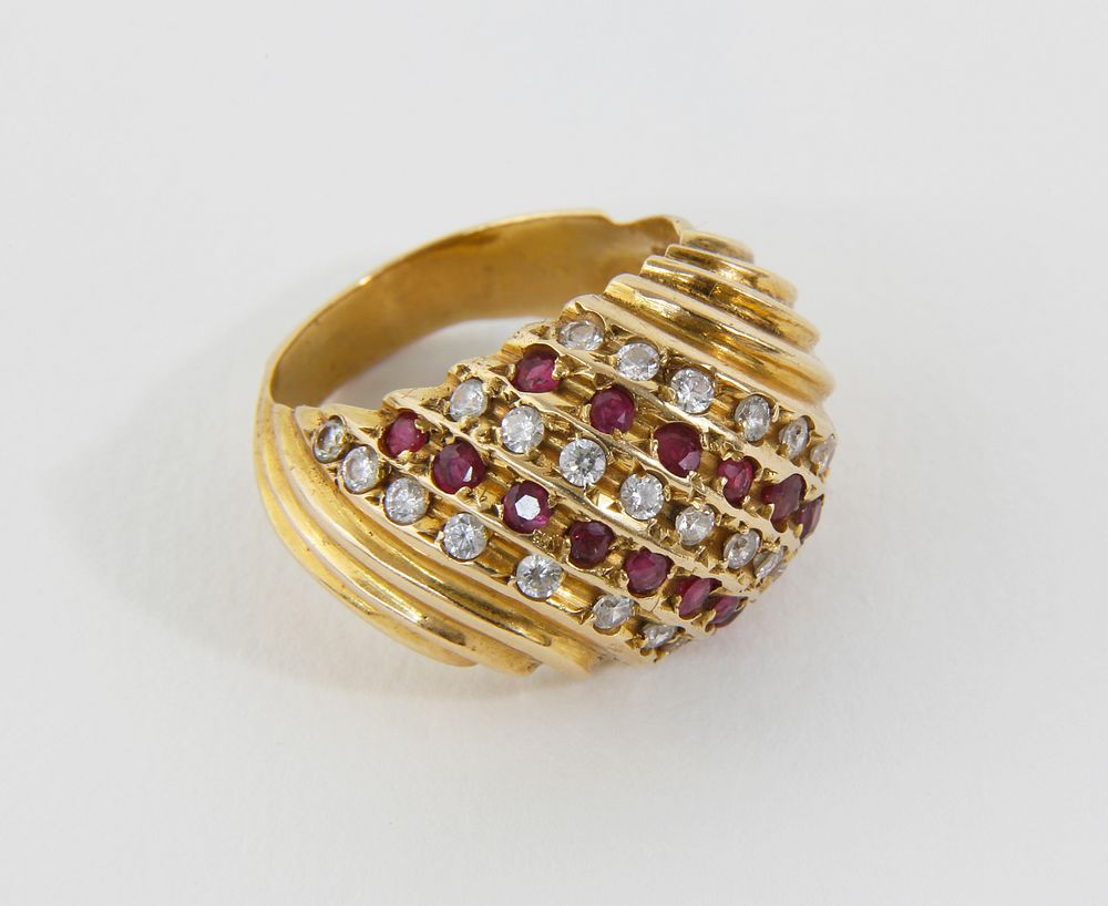 Appraisal: k Yellow Gold Ruby and Diamond Dome Cocktail Ring k