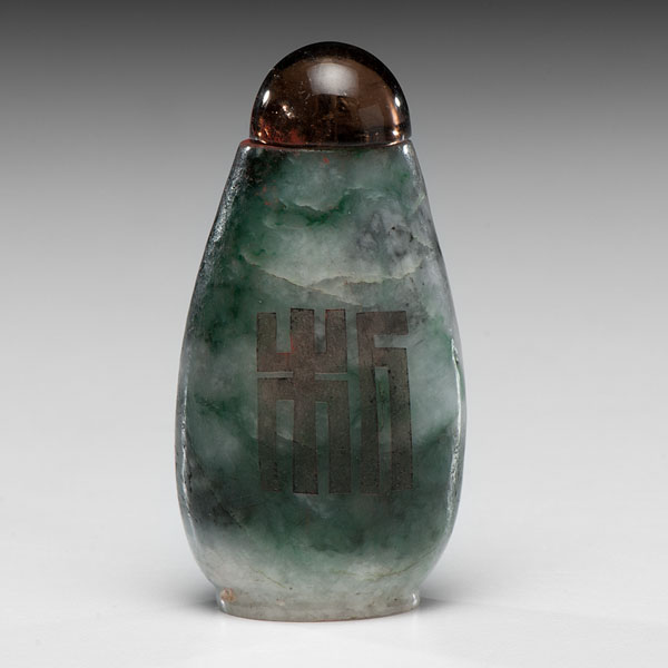 Appraisal: Chinese th century A green jade snuff bottle with white