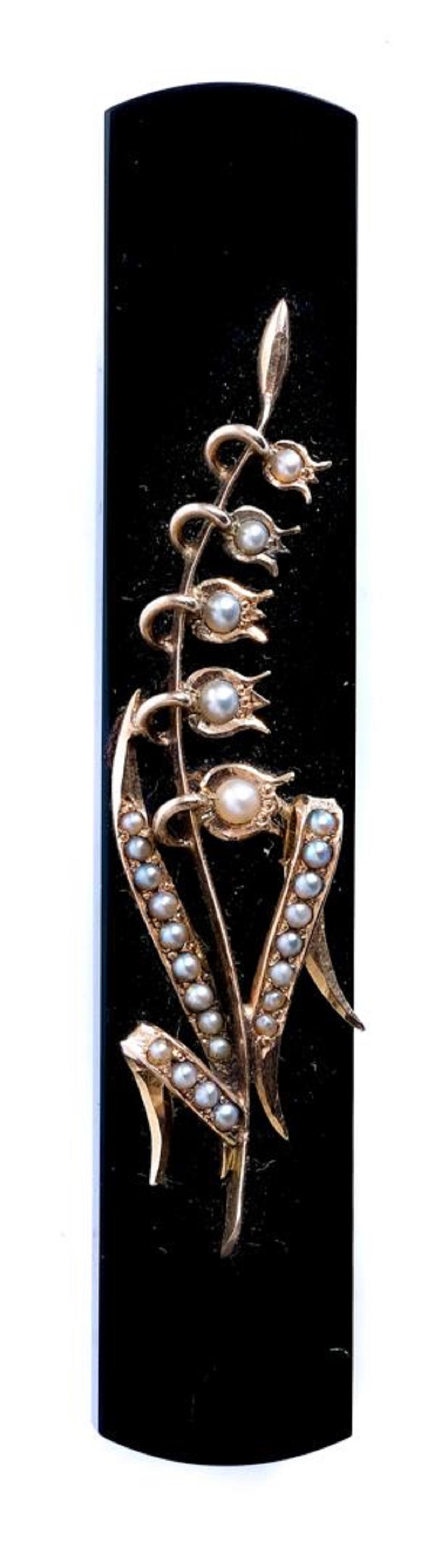 Appraisal: VICTORIAN GOLD SEED PEARL AND BLACK ONYX PIN k rose