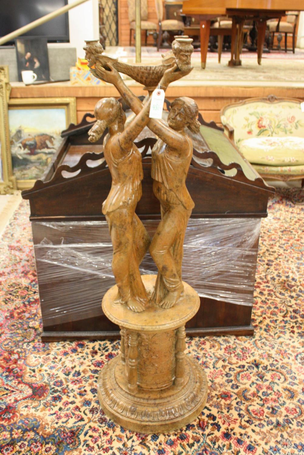 Appraisal: LARGE FIGURAL PATINATED BRONZE FLOOR CANDELABRUM featuring male and female