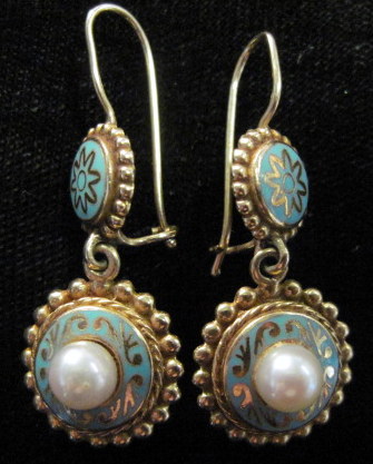 Appraisal: karat yellow gold pearl and enamel drop earrings Two disks