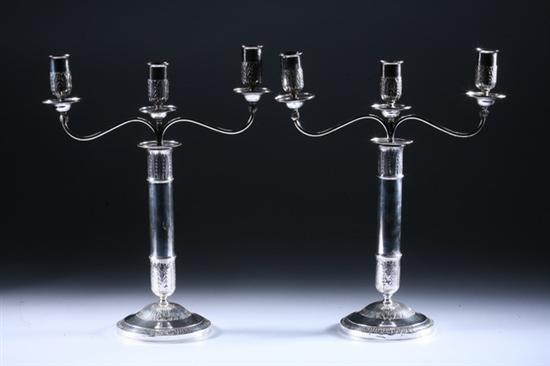 Appraisal: PAIR FRENCH SILVER THREE-LIGHT CANDELABRA th century In the Empire-style