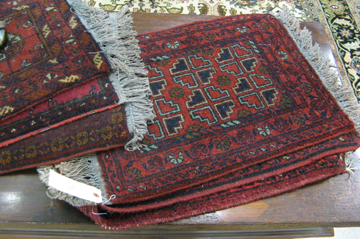 Appraisal: SIX BELOUCHI TABLE MATS hand knotted in a variety of