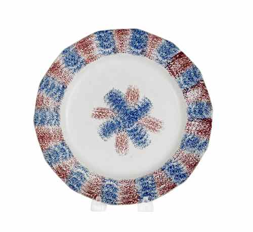 Appraisal: Red and blue rainbow spatter plate th c dia