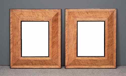 Appraisal: A pair of birdseye maple framed rectangular wall mirrors with