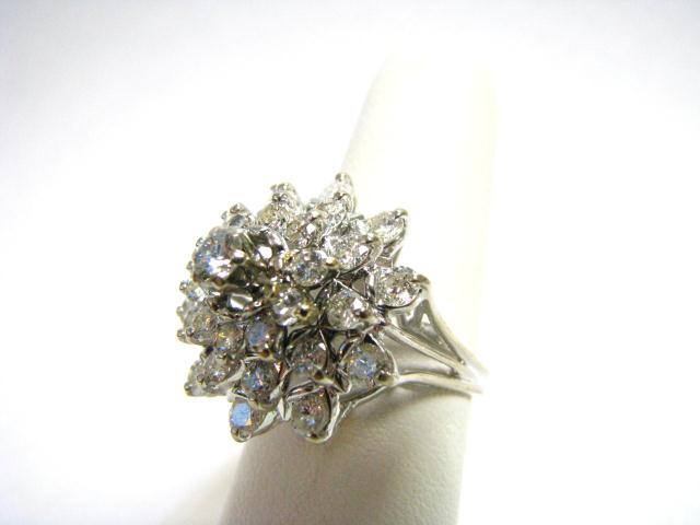 Appraisal: Lady's K white gold ring with approximately round diamonds in