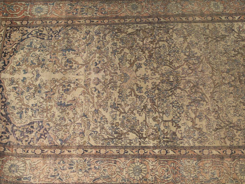 Appraisal: KASHAN PRAYER RUG c the pale biscuit-coloured mihrab filled with