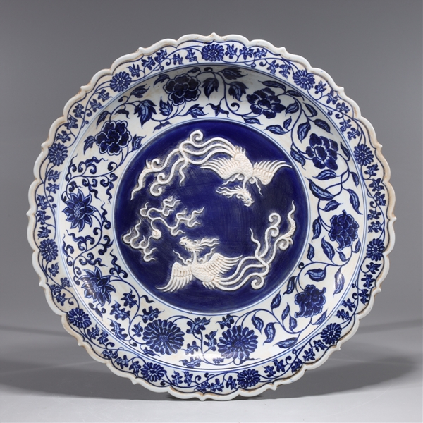 Appraisal: Chinese blue and white porcelain phoenix charger with floral motif