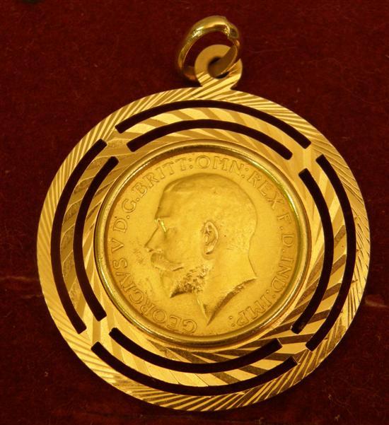 Appraisal: George V gold sovereign in fancy gold mount