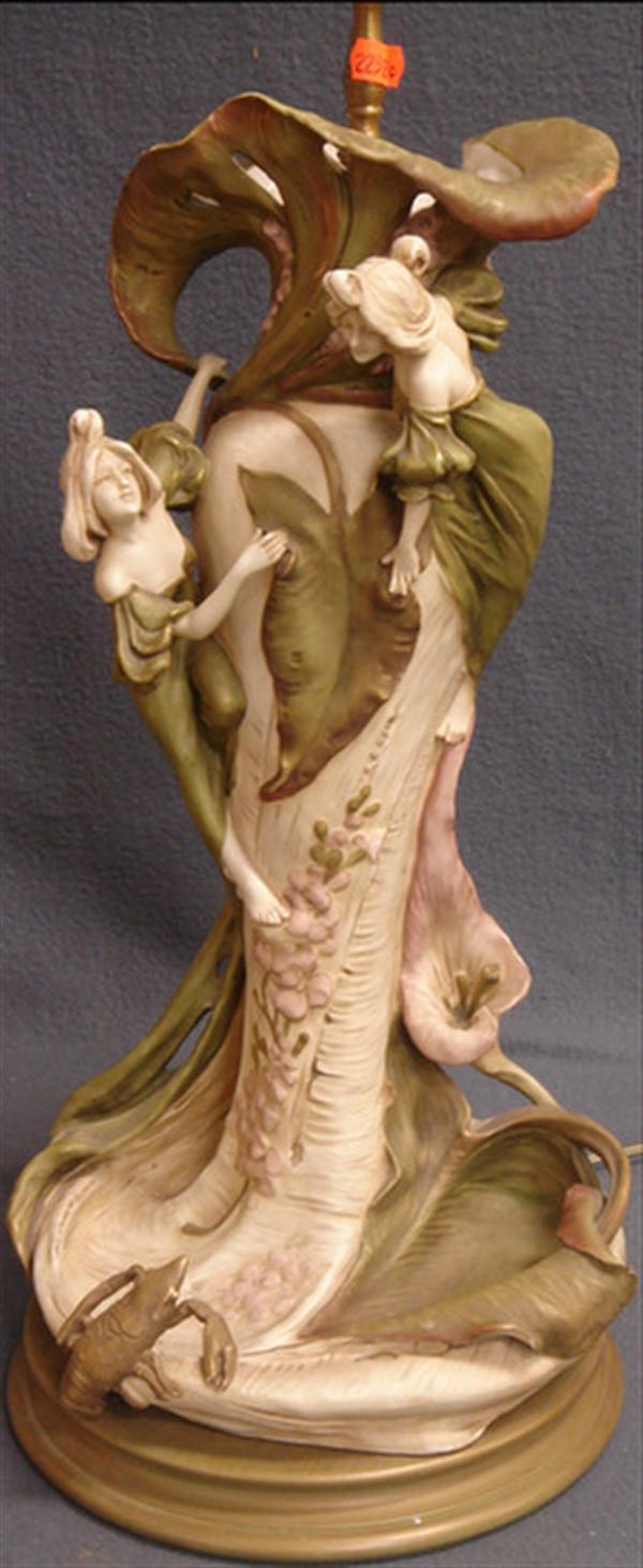 Appraisal: Teplitz porcelain art nouveau vase with maidens and lilies wrapped