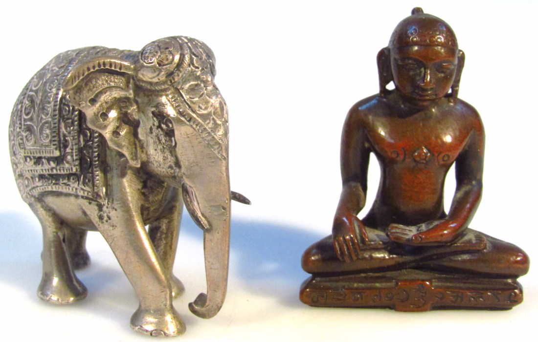 Appraisal: A thC figure of an elephant wearing fine back cloth