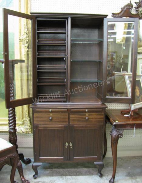 Appraisal: Antique medical or dental cabinet two-piece construction upper section with