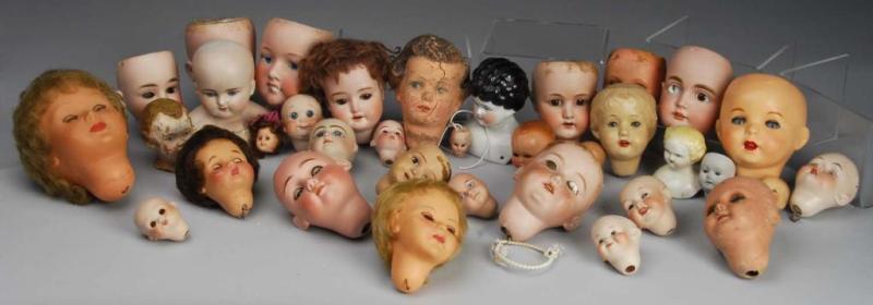 Appraisal: Large Lot of Antique and Vintage Doll Heads Description American