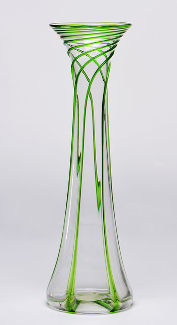 Appraisal: A CLEAR GLASS TRUMPET VASE with green spiralling threaded decoration