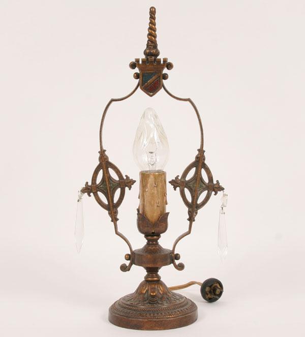 Appraisal: Cast metal lamp with twisted finial and molded wax drip