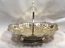 Appraisal: A hallmarked silver swing handled basket dated weight approx ounces