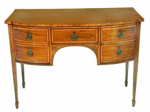 Appraisal: A GEORGE III MAHOGANY BOWFRONTED SIDEBOARD fitted one central drawer