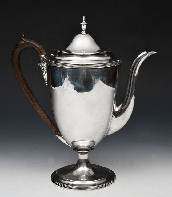 Appraisal: A GEORGE III SILVER ARGYLE plain conical shaped body and