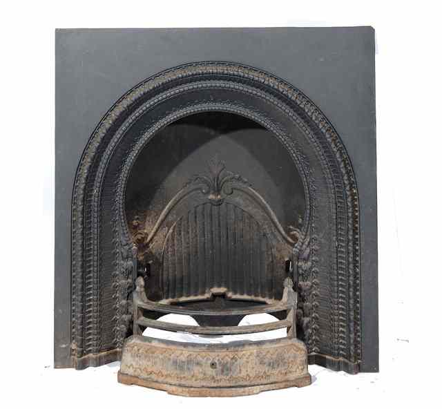 Appraisal: A VICTORIAN CAST IRON FIREPLACE the central arch with moulded