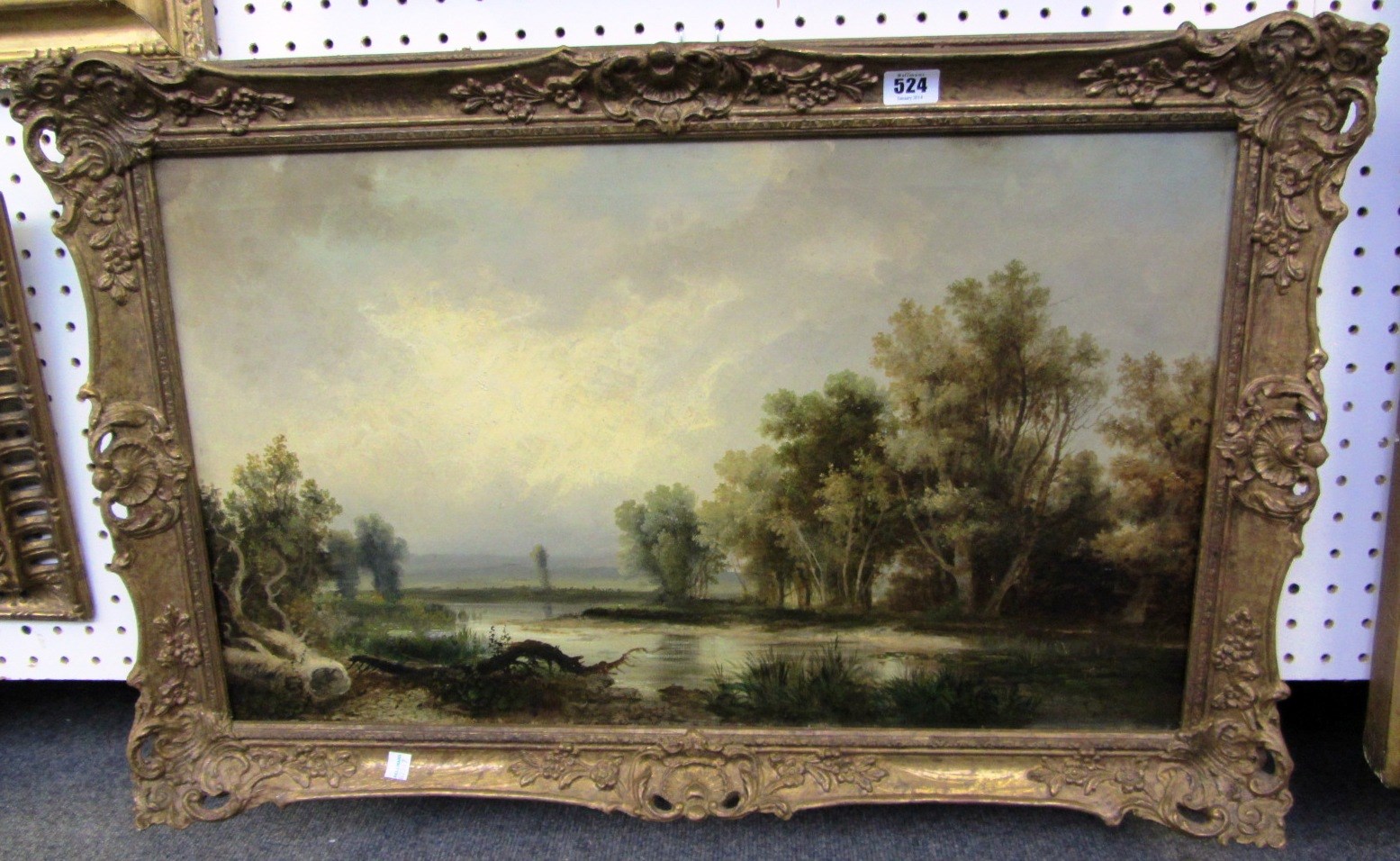 Appraisal: English School late th century Wooded river landscape oil on