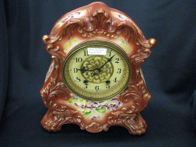 Appraisal: Waterbury Porcelain Cased Clock Victorian rose decor burgundy trim circa