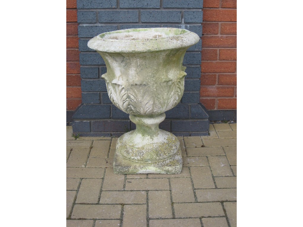 Appraisal: Three Garden Urns with leafage moulding