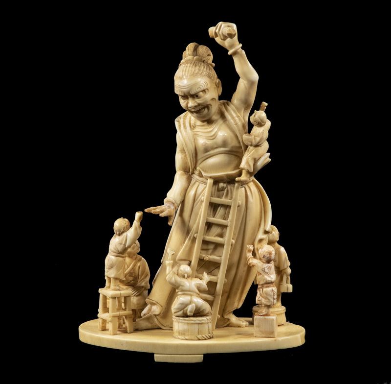 Appraisal: TH C JAPANESE IVORY SAMURAI DIETY STATUE WITH ARTISANS AT