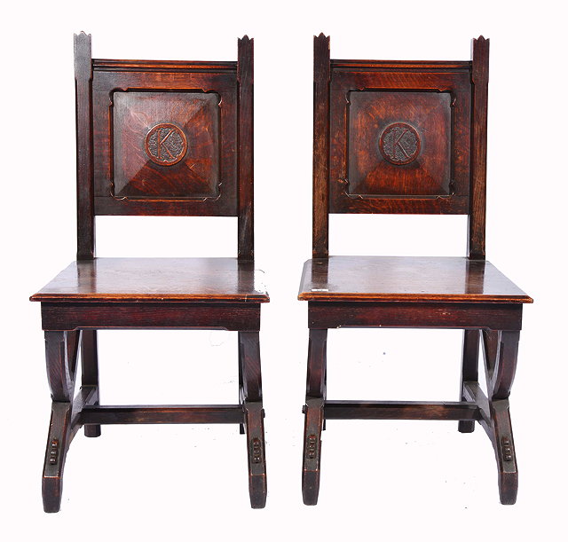 Appraisal: A PAIR OF VICTORIAN OAK GOTHIC REVIVAL HALL CHAIRS IN