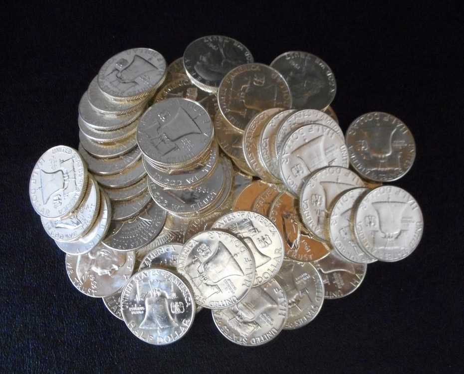 Appraisal: THREE BU ROLLS OF U S SILVER HALF DOLLARS Franklin