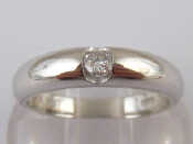 Appraisal: A white metal tests carat gold diamond ring estimated diamond