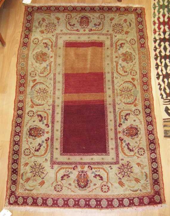 Appraisal: ANATOLIAN antique Narrow central field in red and beige wide