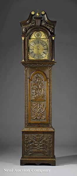 Appraisal: An English Carved Oak Tall Case Clock th c dial