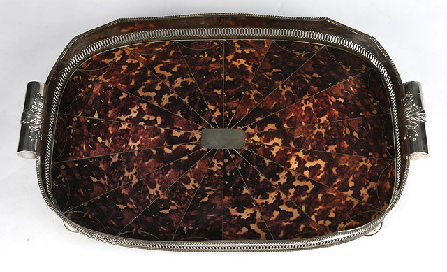 Appraisal: A FAUX TORTOISESHELL AND SILVER PLATED BUTLER'S TRAY with pierced