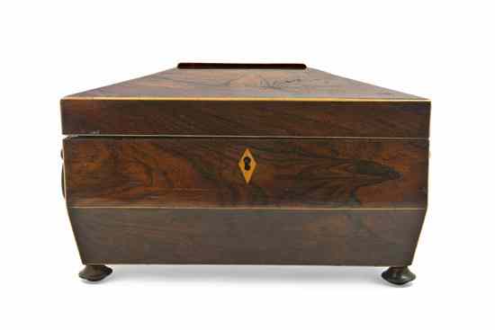 Appraisal: A Regency Rosewood Tea Caddy having a domed lid opening