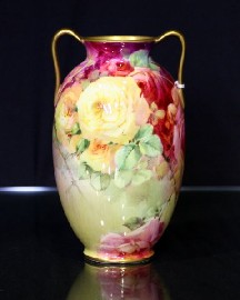 Appraisal: A Royal Doulton twin handled vase by Harry Nixon painted