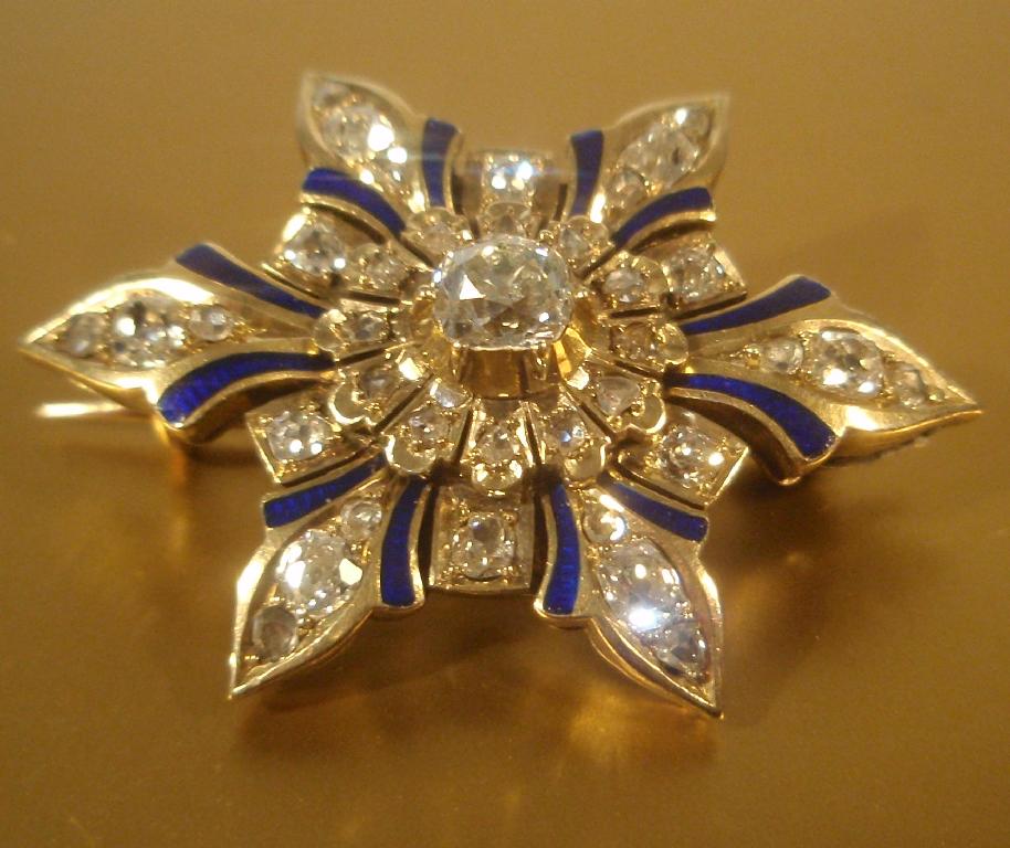 Appraisal: A Victorian brooch of floral form set centrally with a