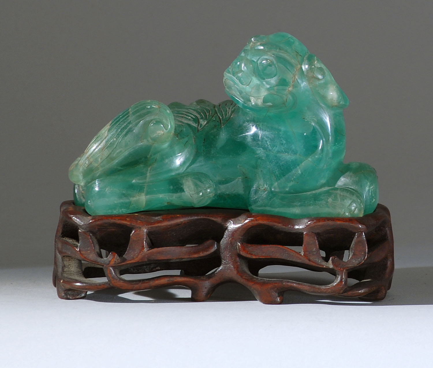 Appraisal: GREEN QUARTZ CARVING th CenturyIn the form of a reclining