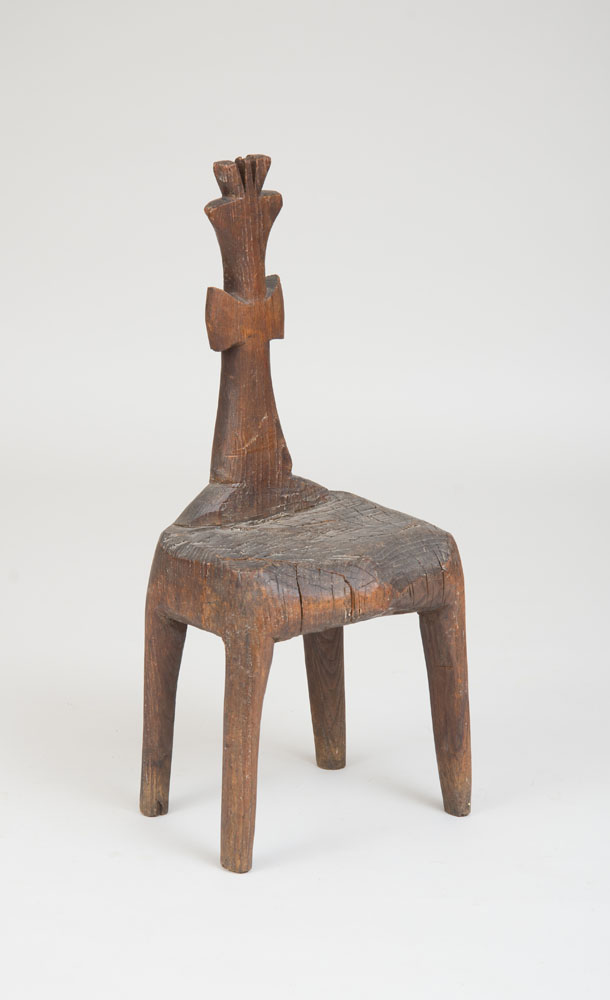 Appraisal: AFRICAN CARVED HARDWOOD CHAIR x x in Property from the