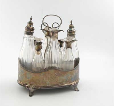 Appraisal: A George III silver cruet stand by Henry Chawner London