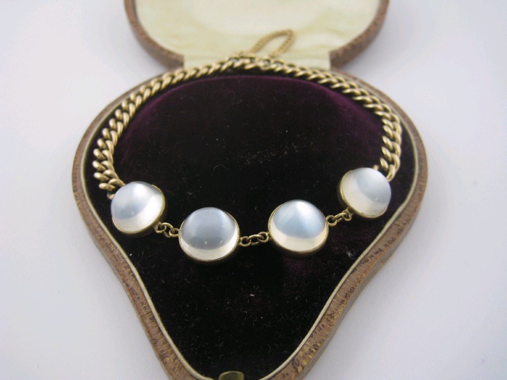 Appraisal: A Moonstone Bracelet the front collet-set four large cabochons on