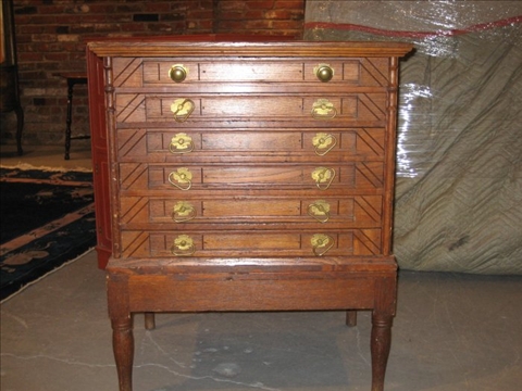 Appraisal: WILLIMANTIC SPOOL COTTON OAK CABINET The rectangular top over six